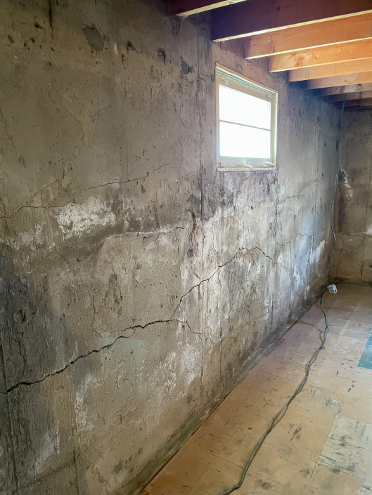 basement window needing foundation repair